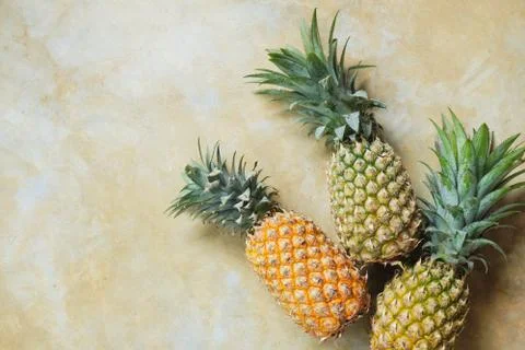 Pineapple on Stone Table Background Top Down View Stock Photos
