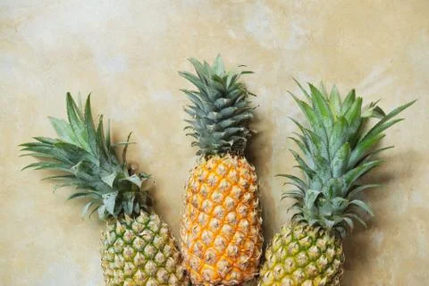 Pineapple on Stone Table Background Top Down View Stock Photos