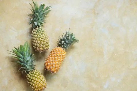 Pineapple on Stone Table Background Top Down View Stock Photos