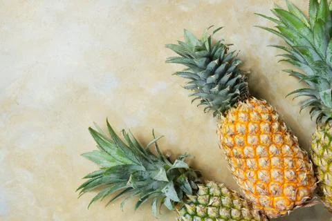 Pineapple on Stone Table Background Top Down View Stock Photos