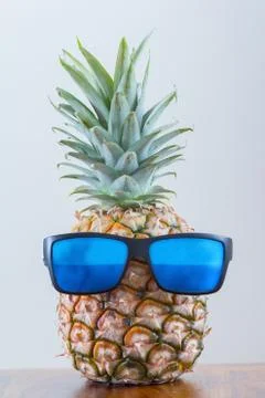 Pineapple with sunglasses Stock Photos