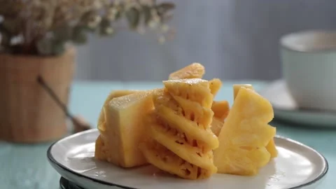 Pineapple Thai fruit on the white plate. Video stock 154753796