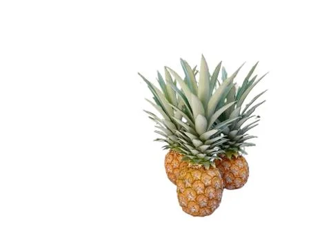 Pineapple, three pineapple dresses on a white background Stock Photos