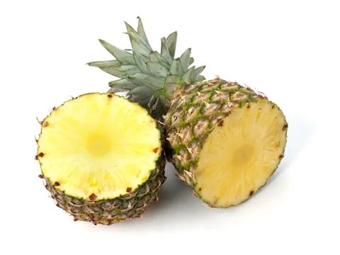 Pineapple on white in two pieces Stock Photos