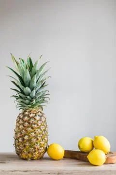 Pineapple on wood Stock Photos