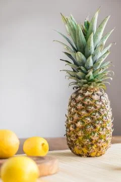 Pineapple on wood Stock Photos