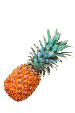 Pineapple on yellow background vertically Stock Photos