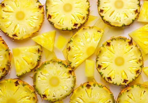 Pineapple yellow slices background. Stock Photos