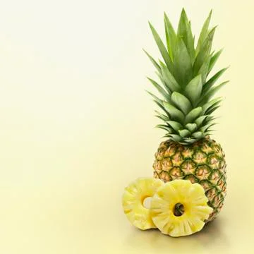 Pineapple on yellow solid background Stock Photos