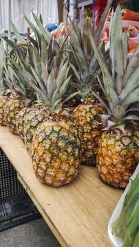 Pineapples on display at the fair Stock Photos