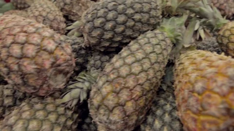 Pineapples in farmer's market 스톡 동영상 44089366