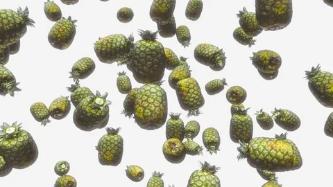 Pineapples Floating Against a White Background 库存影片 72299676
