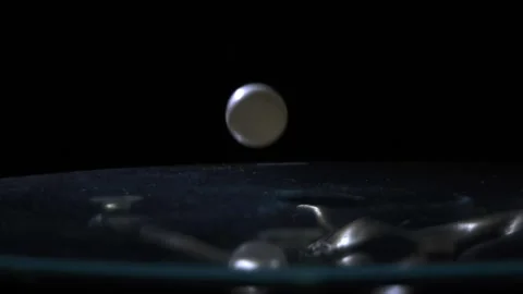 Ping Pong Ball Bouncing on Table in Slow Motion Stock Footage 333548409
