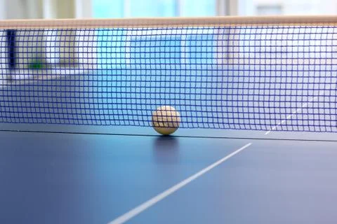 Ping Pong Ball on the Table Tennis Net Stock Photos
