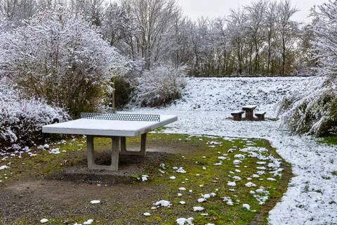 Ping pong table covered with snow Stock Photos