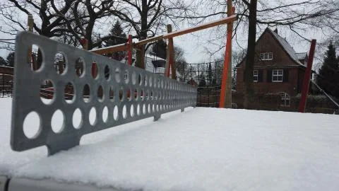 Ping Pong / Table tennis table covered with snow and metal net / web / grid Stock Photos
