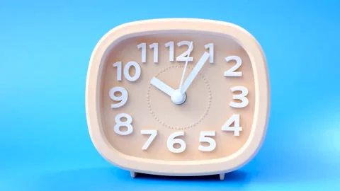 Pink alarm clock on blue background close-up, front view. Stock Footage 227478774
