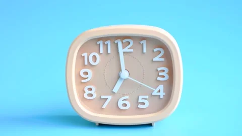 Pink alarm clock on blue background close-up, front view. Stock Footage 228570405