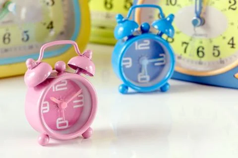 Pink alarm clock Stock Photos