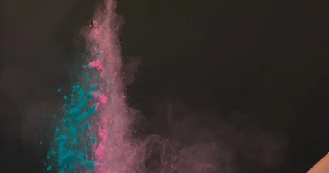 Pink and blue powder explode upwards Stock Footage 98212309