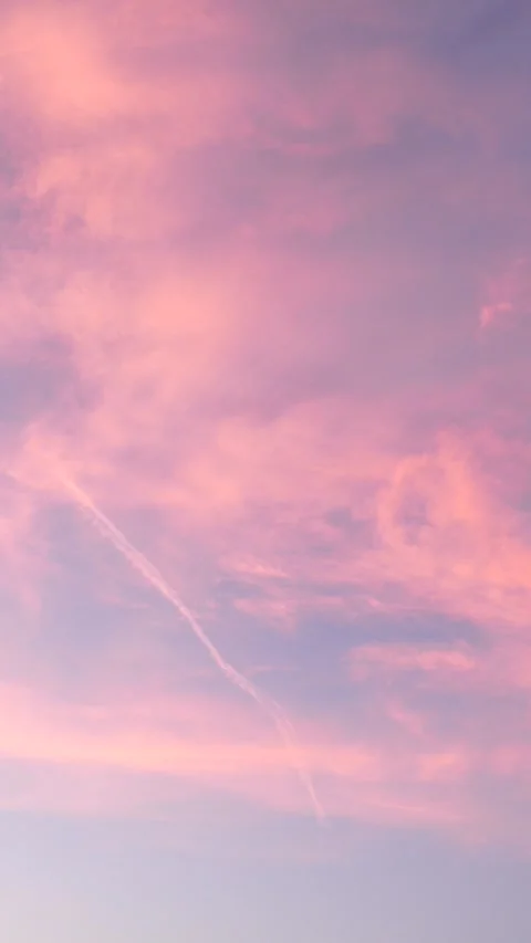 A pink and blue sky with clouds Stock Footage 276343887