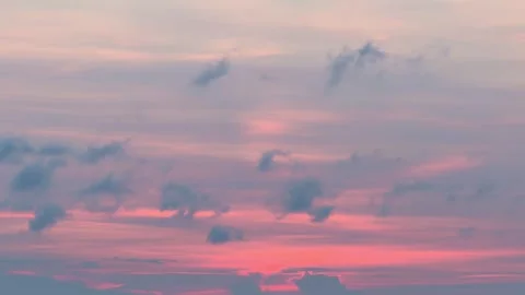 Pink and blue sky at sunset with slow moving clouds Stock Footage 340283175