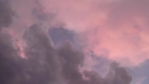 Pink and Grey Clouds Clash Together Stock Footage 265423130