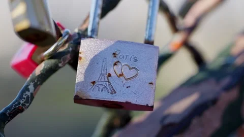 Pink and rusty Love lock in a fence in Montmartre Paris during summer days Stock Footage 310347796