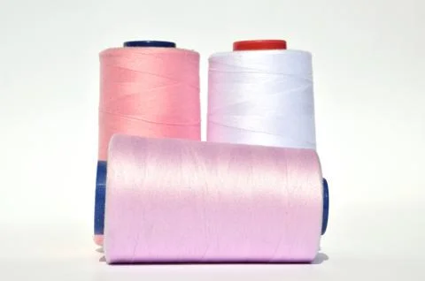 Pink and white threads Stock Photos
