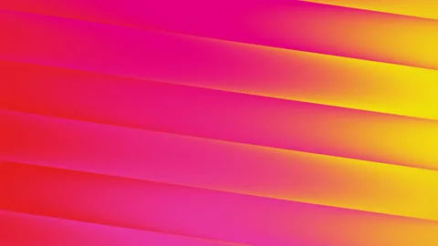 Pink and yellow diagonal stripes blend smoothly creating vibrant gradients. Stock Footage 293486514