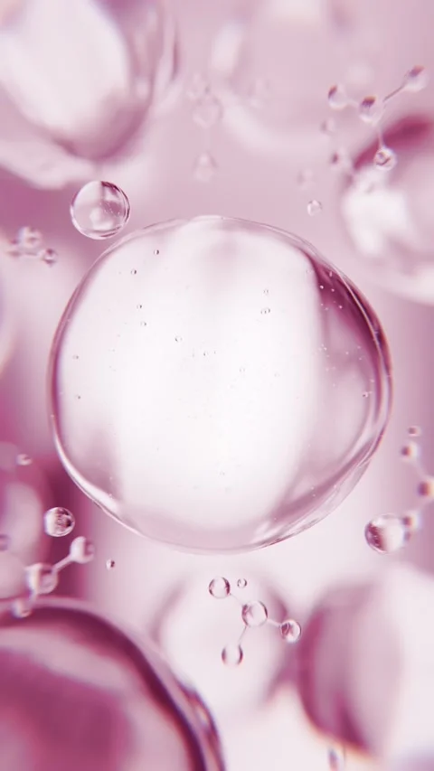 Pink anti-aging serum bubbles. Luxury skincare cosmetics macro 3D background Stock Footage 344647118