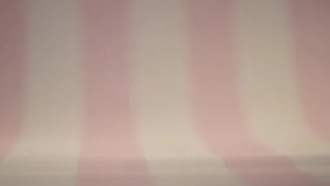 Pink applicators and sponges fall in slow motion. Stock Footage 77512056