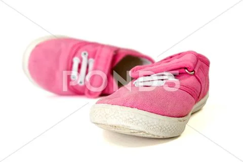 Pink baby shoes Stock Photos
