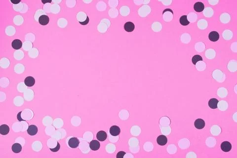 Pink background with confetti. Stock Photos