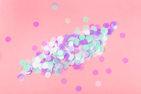 Pink background with confetti. Stock Photos