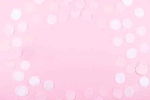 Pink background with confetti. Stock Photos