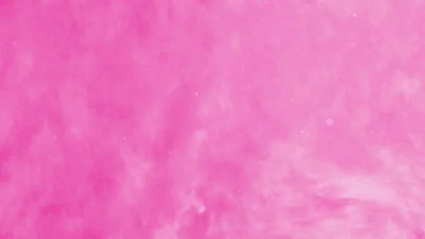 Pink background features faint clouds and tiny sparkles Stock Footage 297660038
