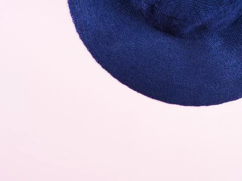 Pink background with female hat Stock Photos