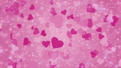 Pink background with a hearts and glowing particles Stock Footage 84626834