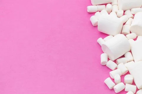 Pink background with marshmallows Stock Photos