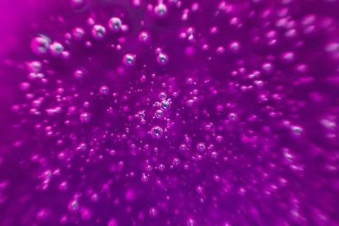 Pink background, texture with bubbles in some liquid. Stock Photos