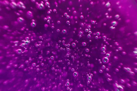 Pink background, texture with bubbles in some liquid. Stock Photos