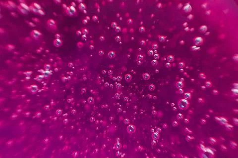 Pink background, texture with bubbles in some liquid. Stock Photos