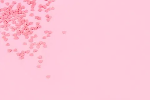 Pink background with tiny hearts. Valentine's day concept. Stock Photos