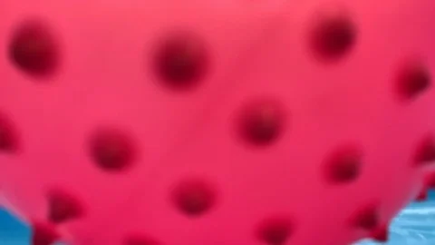 Pink Ball Roll Down on a Water Slide to a Swimming Pool Stockbeeldmateriaal 125417543