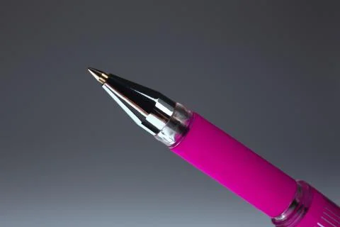 Pink ballpoint pen Stock Photos