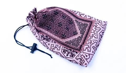 Pink Batik Drawstring Pouch Isolated on White Background Foto stock
