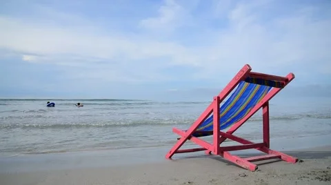Pink beach chair Stock Footage 56958650