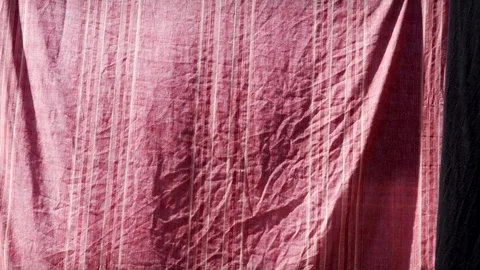 Pink bed sheet hanging on washing line stock footage Vidéo 116653860
