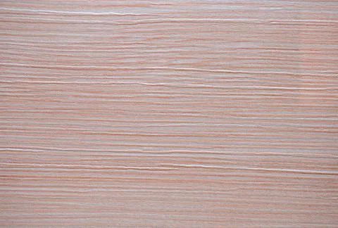 Pink beech, a flat surface of natural light wood with a striped pattern close Stock Photos